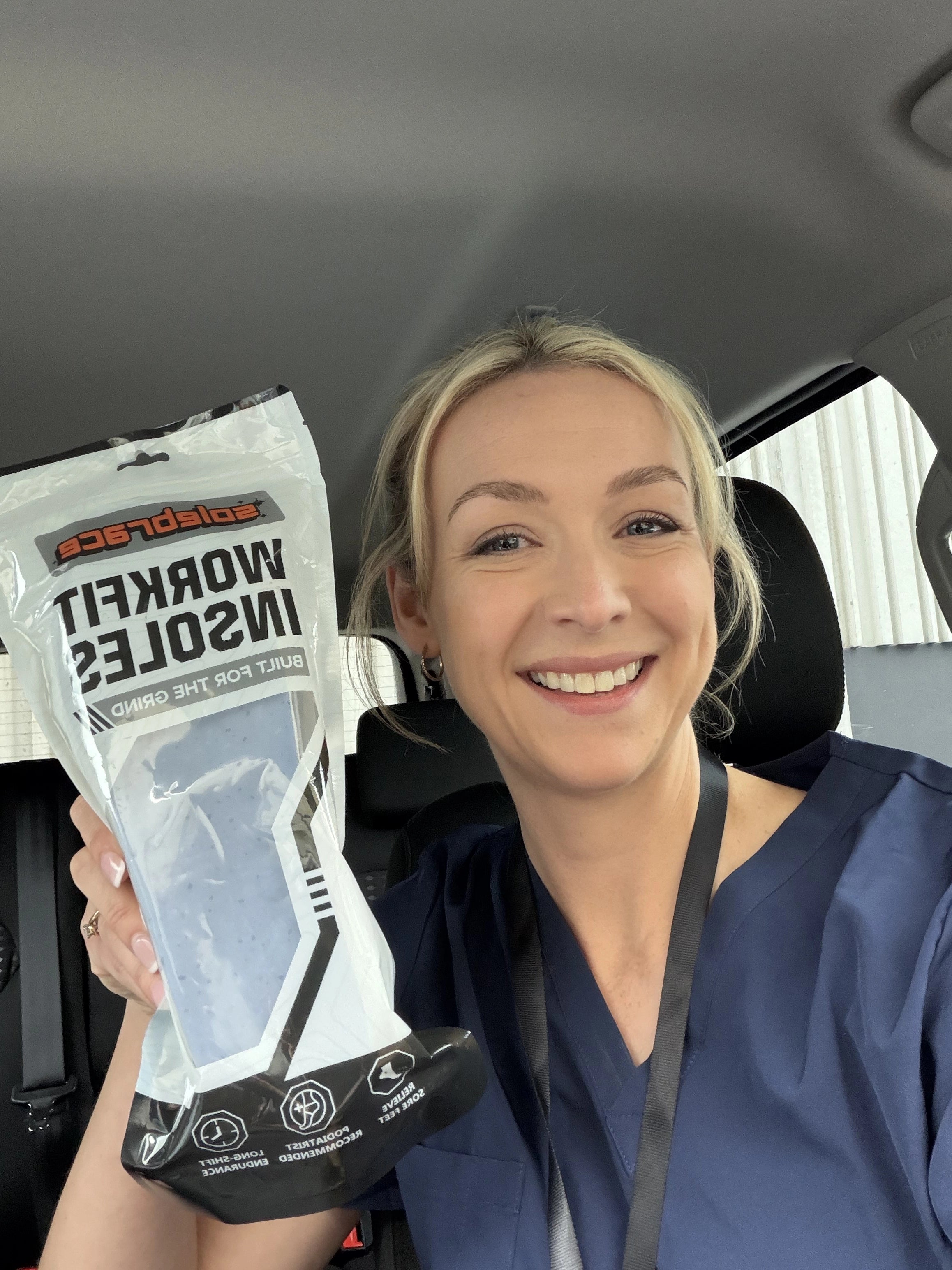 Nurse holding WorkFit Insoles